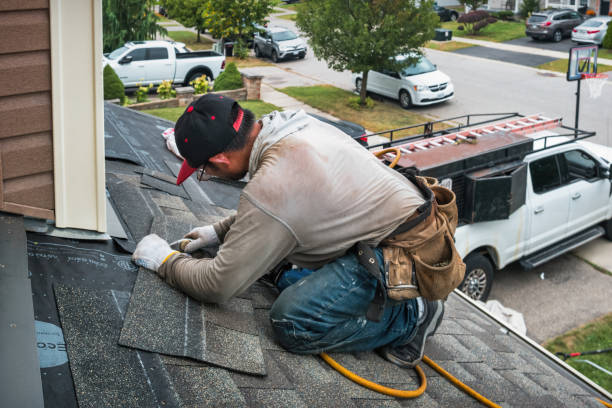 Professional Flat Roof Repair technician working in Dubuque, IA